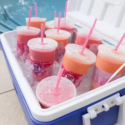 Baskin-Robbins smoothies sitting in a cooler by the pool