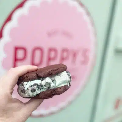 Poppy's chocolate ice cream sandwich in front of mobile truck