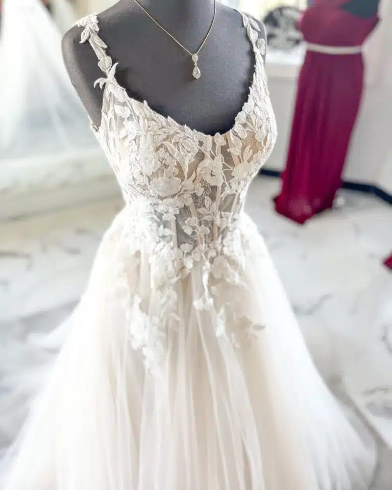 Dress from Vivi's accessorized with a pendant necklace