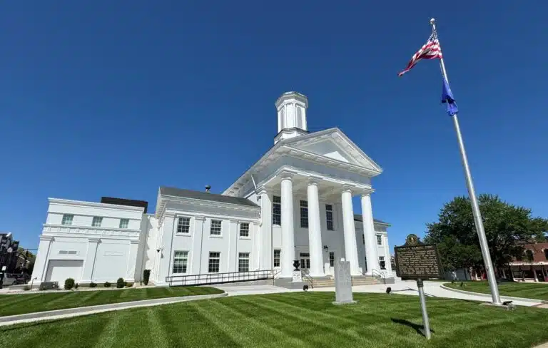 Exterior of the Madison County Courthouse with well-manicured lawn