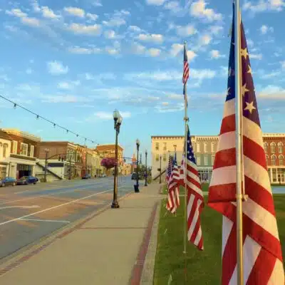 American flags lined in front of courthouse square