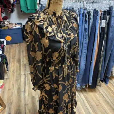 Long-sleeve black and gold dress from Cyrilla's