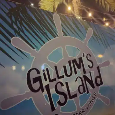 Pirate ship wheel with Gillum's Island written on wall
