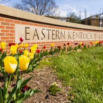 Spring flowers around the Eastern Kentucky University sign