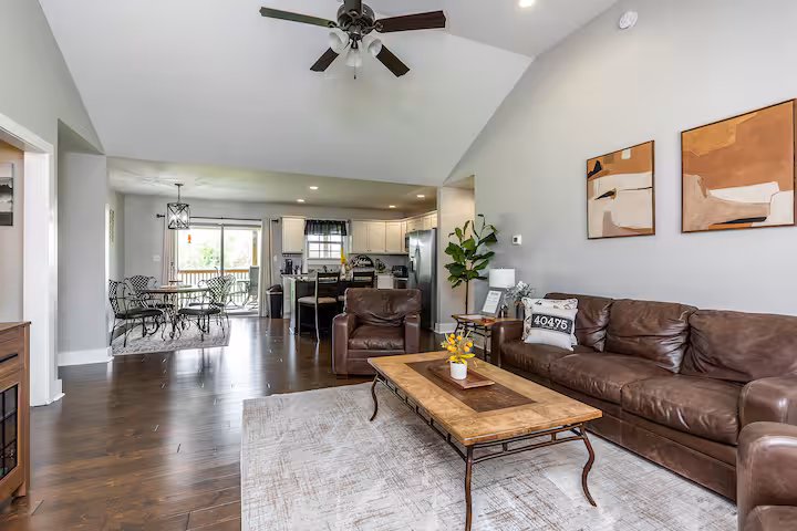 Open floorplan of a short-term rental, showcasing the living room furnishings