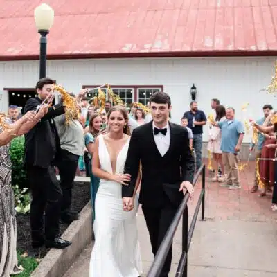 Couple Walking Through Confetti Tassels