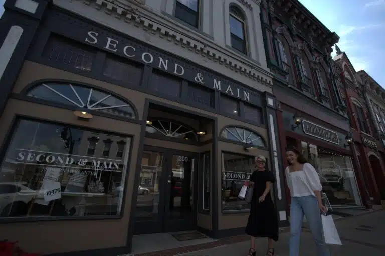 Two women downtown shopping outside Second & Main