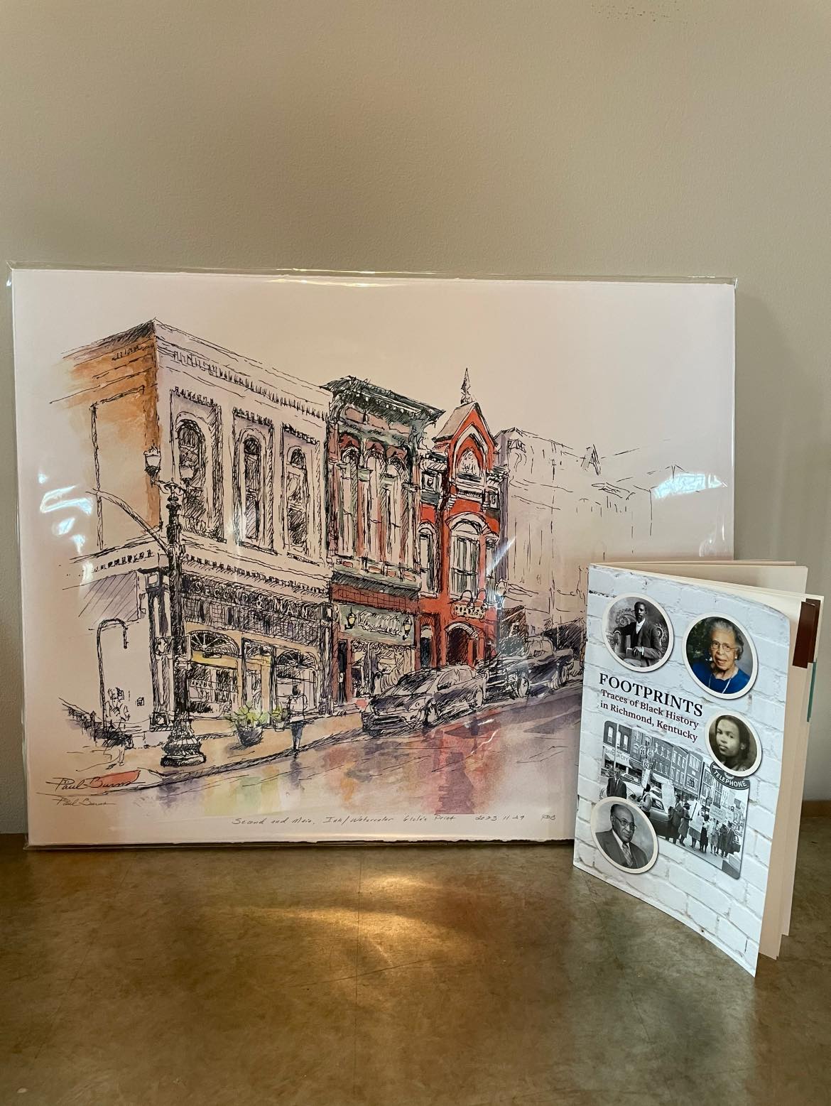 Artwork of downtown Richmond with copy of Footprints