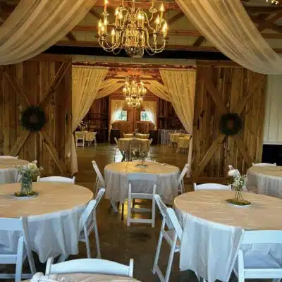 Looking Through Building of Table Set-up at Homestead Farm Wedding Barn