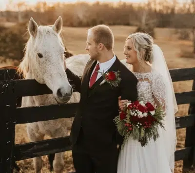 Golden hour of bride and groom with white horse at SMK Agricultural Venue