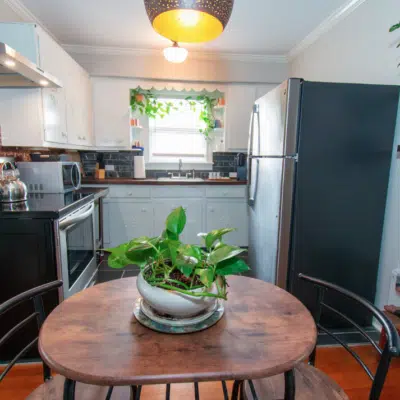 Kitchen and dining table inside Westfield Blue (Airbnb)