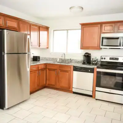 Kitchen inside College-town Comfort (Airbnb)