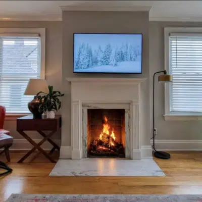 Fireplace in living room of Luxury on Main - West (Airbnb)