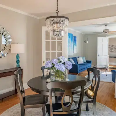 Dining table and light fixture detail of Luxury on Main - North (Airbnb)