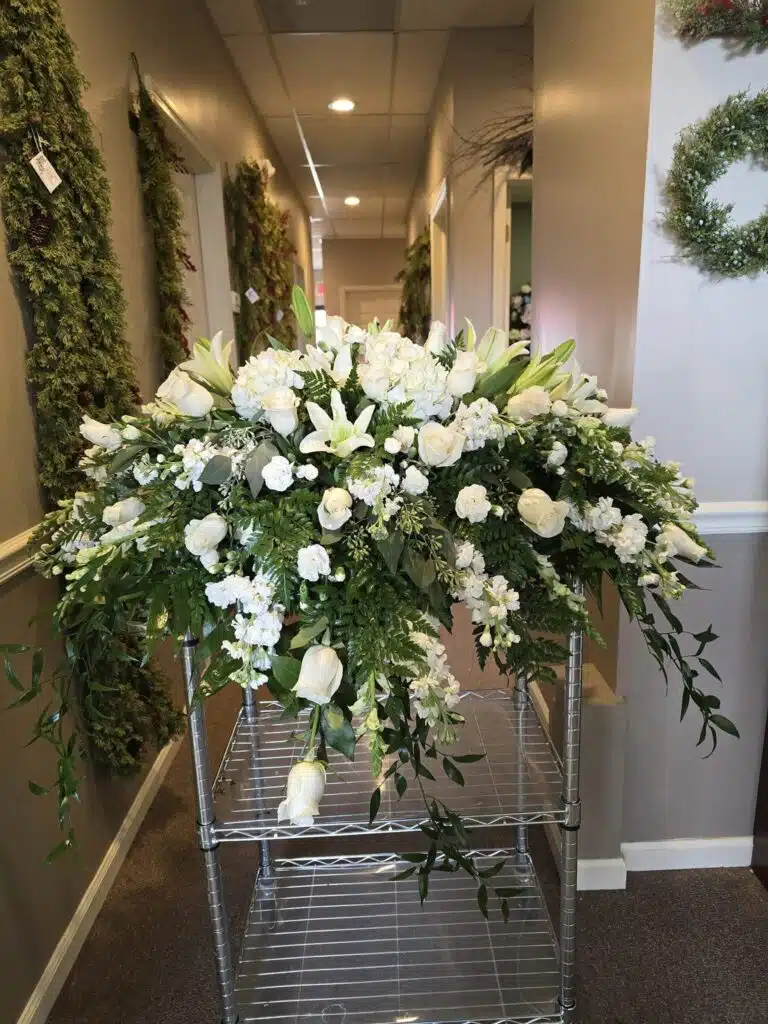 Unique Designs Flowers 7 Gifts white floral arrangement