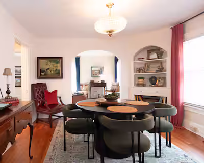 Dining space of short-term rental featuring vintage architecture