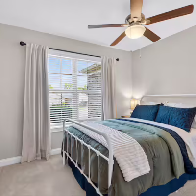 Primary bedroom inside short-term rental