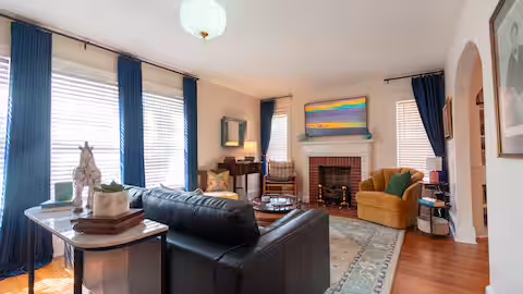 Living room of short-term rental showcasing the framed art TV