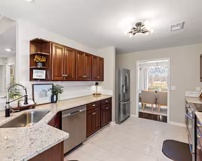 Kitchen of short-term rental featuring stainless steel appliances