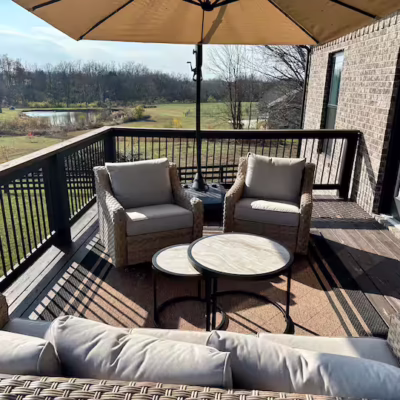 Outdoor patio of a short-term rental featuring outdoor furniture
