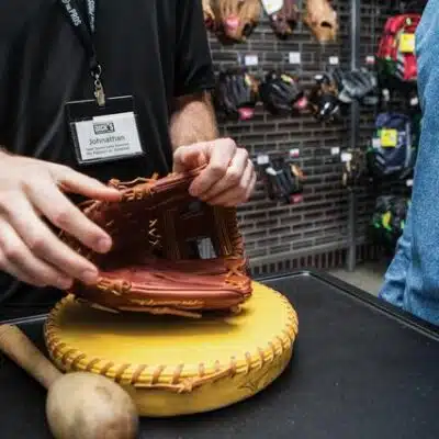 Glove service at counter of Dick's Sporting Goods